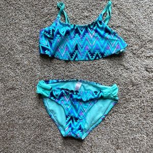 Justice girls’ bathing suit, size 10.